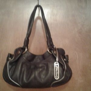 Purple handbag by Bmakowsky.